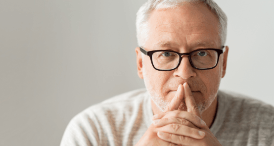 Older man considering periodontal therapy option