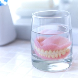 Dentures in Lancaster soaking in solution