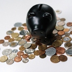 Piggy bank representing the cost of emergency dentistry