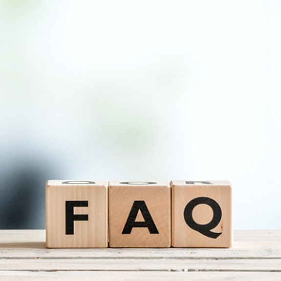FAQ wooden letter blocks on ledge