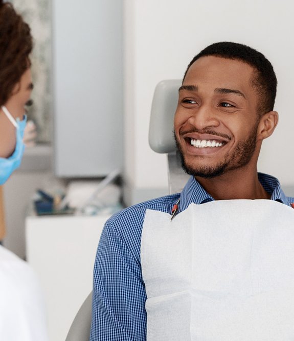 Man smiles after getting tooth-colored fillings in Lancaster