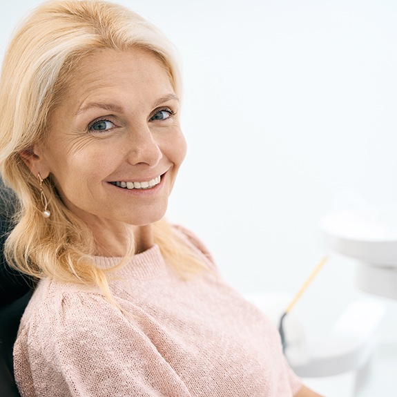 a dental implant patient smiling 