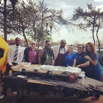 Team members outdoors at community event