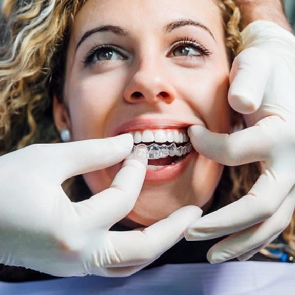 a patient receiving clear aligners for orthodontic treatment 