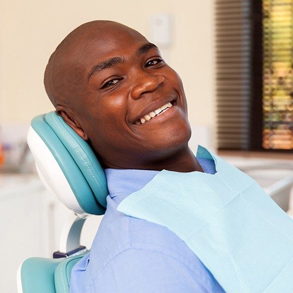 Man smiling during dental checkup