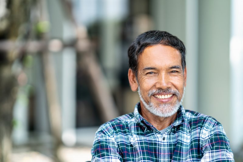 Man smiling after cosmetic dentistry