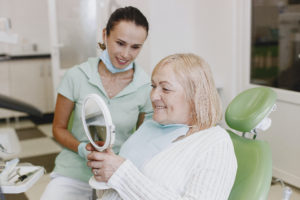 Older female patient at dentist
