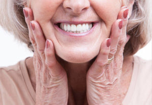 Close up of older woman with dentures