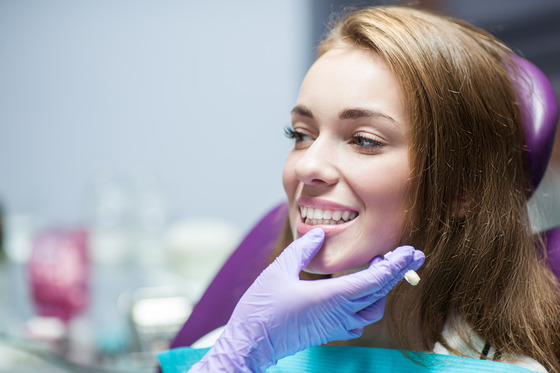 patient visiting dentist for checkup and cleaning