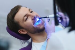 Man getting cosmetic dental bonding